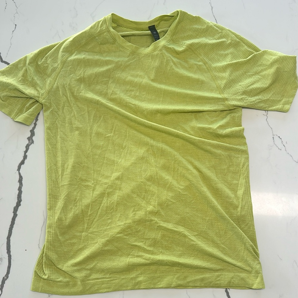 I am selling a green sweatshirt from lululemon